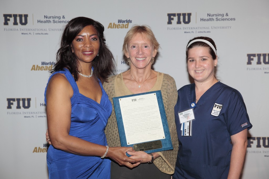 Dr. Ora Strickland (far left), Dean of the College of Nursing and Health Sciences, with Kim Greene (middle), Executive Director of the Dr. John T. Macdonald Foundation, and Naiviv Hernandez (far right), at the Donors and Scholars Luncheon in October 2011.