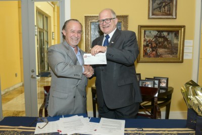 Joseph “Pepe” Badia, president of Badia Spices, Inc. and FIU President Mark B. Rosenberg