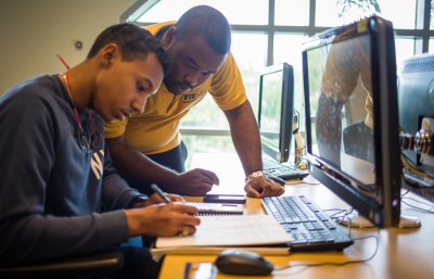 Garfield Jugar is one of 168 Learning Assistants at FIU helping other students in peer mentoring. Jugar works in FIU’s Mastery Math Lab.