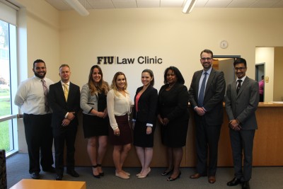 From left to right: Attorney Karim Batista; FIU Law students Anthony Monico; Claudia Cobreiro, Alexis Gonzalez, Krystin Montersil; Senior Associate Dean Michelle Mason; attorney Carlos Gonzalez; and FIU Law student Michael Lowe.