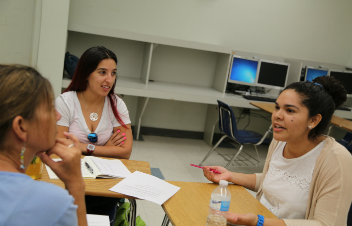 Students in assistant professor Maria Lovett’s Teaching Diverse Population’s class discuss so-called “Gangster Gardener” Ron Finley’s TED Talk, presented by students at Miami Northwestern Senior High School.