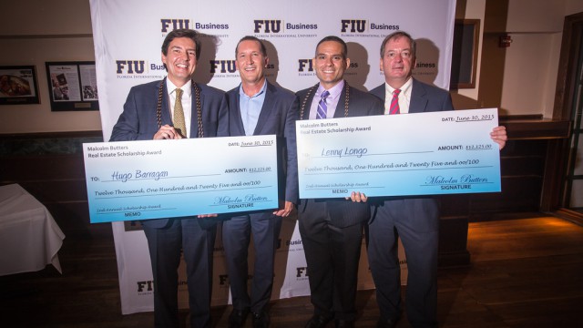 Hugo R. Barragan and Lenny Longo, newly graduated from the Master of Science in International Real Estate program, are presented with the Malcolm Butters Real Estate Scholarship Awards by Malcolm Butters and William G. Hardin.