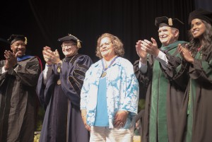 From left to right: Luther Brewster, Ph.D.; President Mark B. Rosenberg; Manolina Sosa; Dr. John A. Rock; and Dr. Manju Korattiyil. 