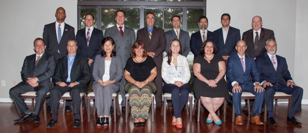 From left to right, top row: Duane Wiles, Marcel Monnar, Benjamin Sardiñas, Eddie Hondal, Juan Carlos Alexander, Jorge F. Hernandez, Michael A. Hernandez, Howard Limpan. Bottom row: Frank Pena, Miguel Larrea, Sharon Fine, Gina Duarte-Romero, Maria D. Garcia, Ana L. Martinez, Enrique Piñeiro, Erick Valderrama. 